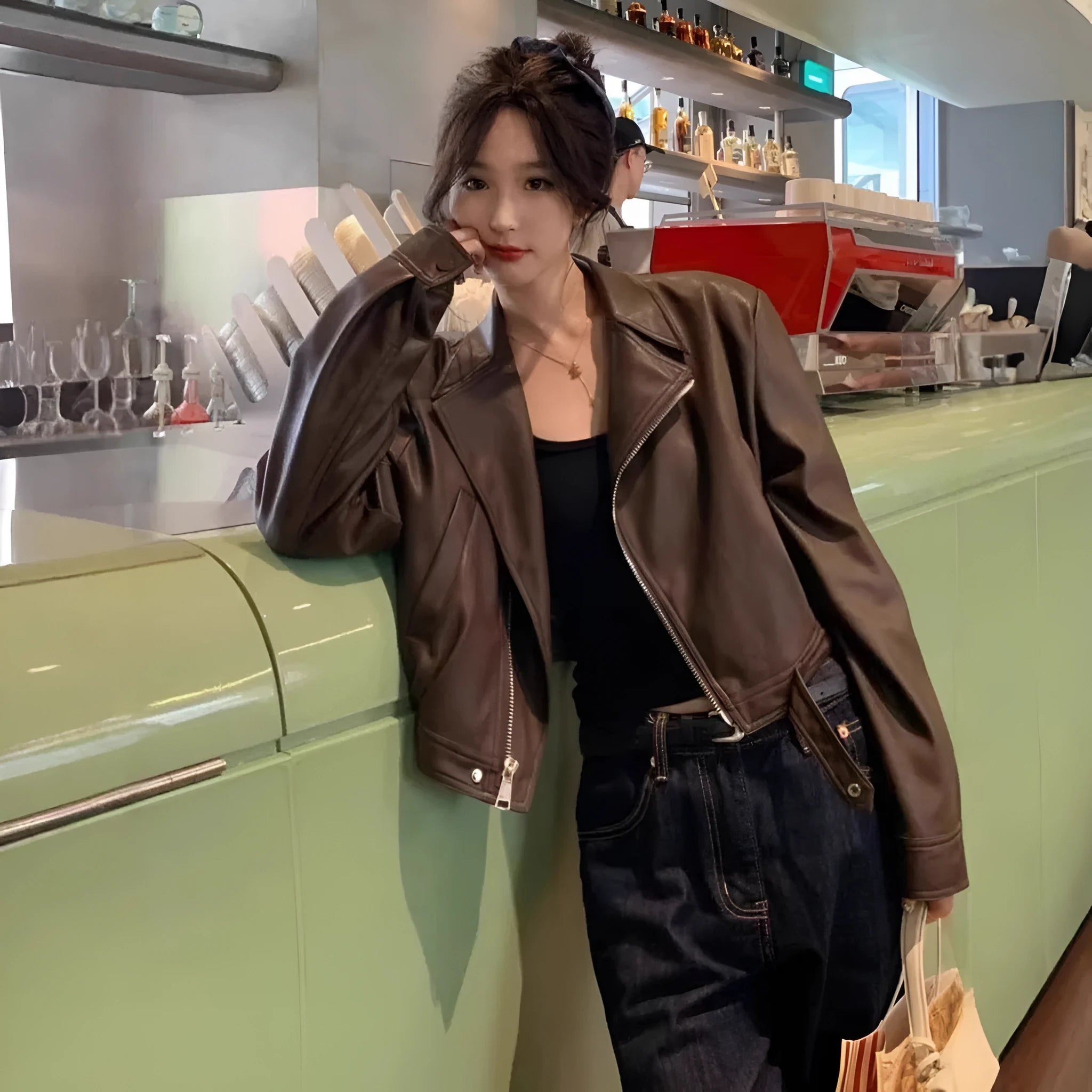 Brown women's retro slim-fit imitation leather coat with a pocket and regular sleeves.