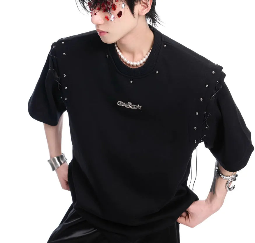 Black deconstructed short sleeve t-shirt with lace-up detail and a cutout design on a mannequin.