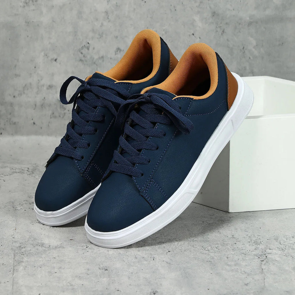 Casual platform sneaker with cross strap detail on artificial PU upper in beige brown colour