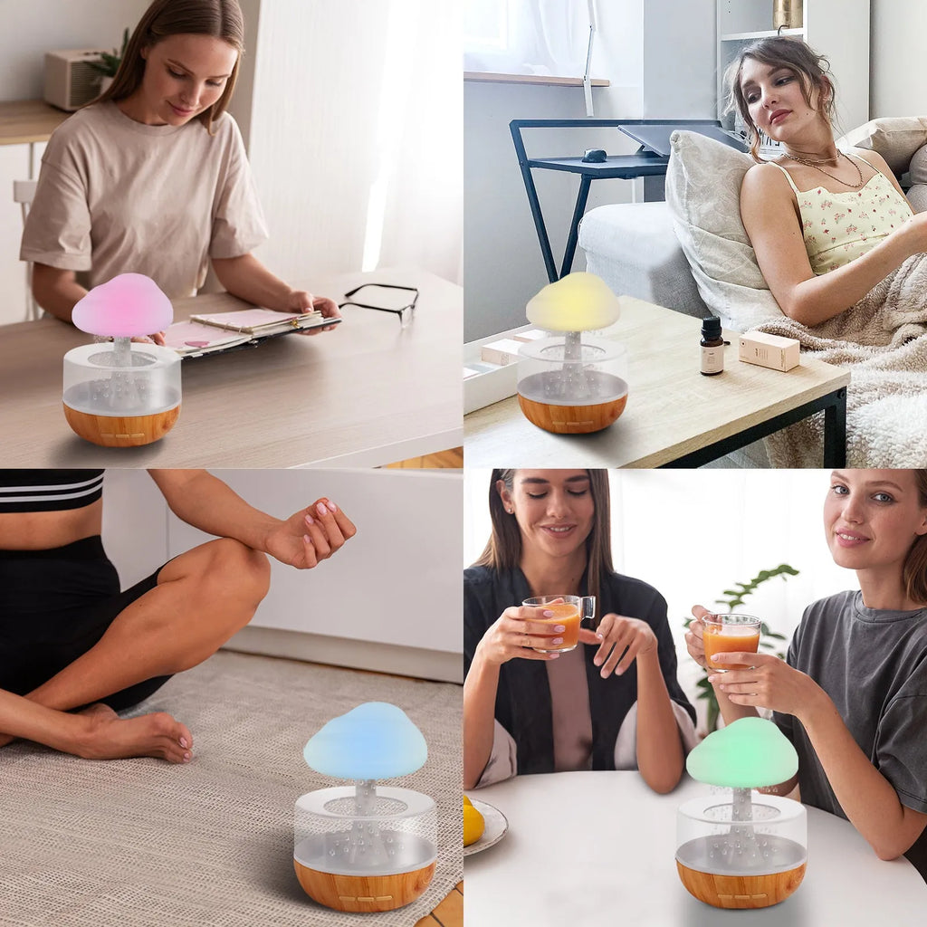 White cloud-shaped humidifier with coloured night light and mist output on a table