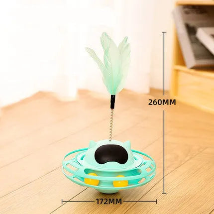 Pink cat stick toy with a tumbler turntable design on a white surface.