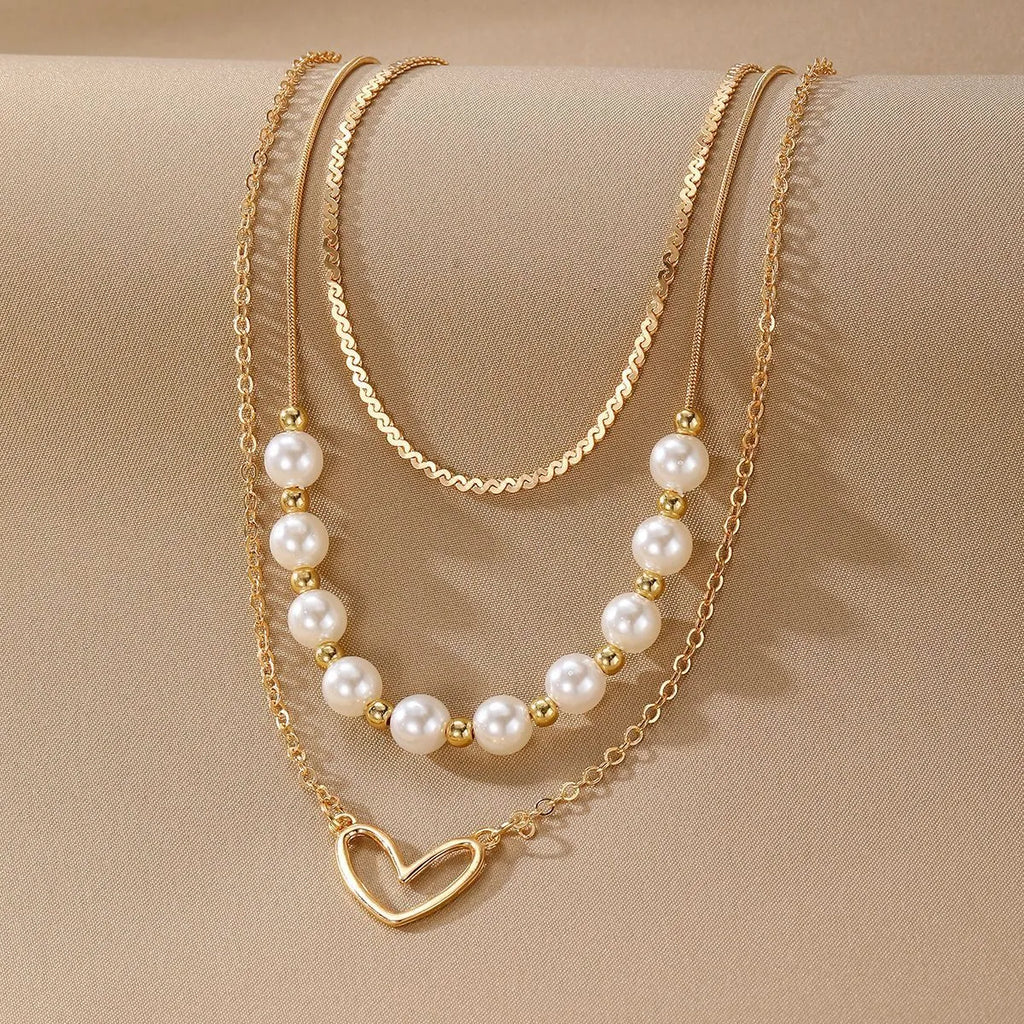 Vintage gold electroplated heart pendant necklace with adjustable pearl chain