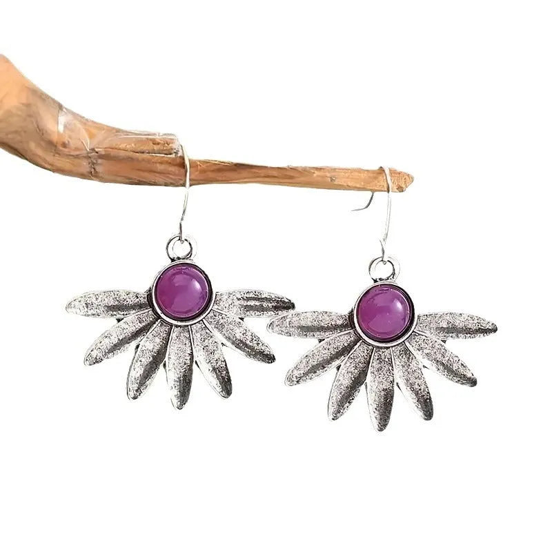 Purple Bohemian style earrings with resin flowers and animal zodiac pendant drops