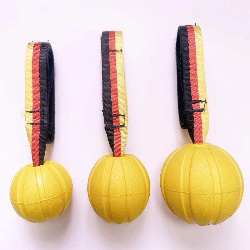 Floating water bite-resistant pet training ball in camouflage and yellow colours showing three size options