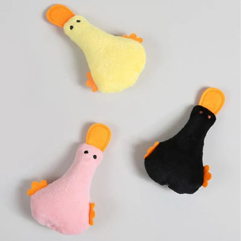 Colourful duck-shaped plush pet toy with squeaker and catnip for cats and dogs.