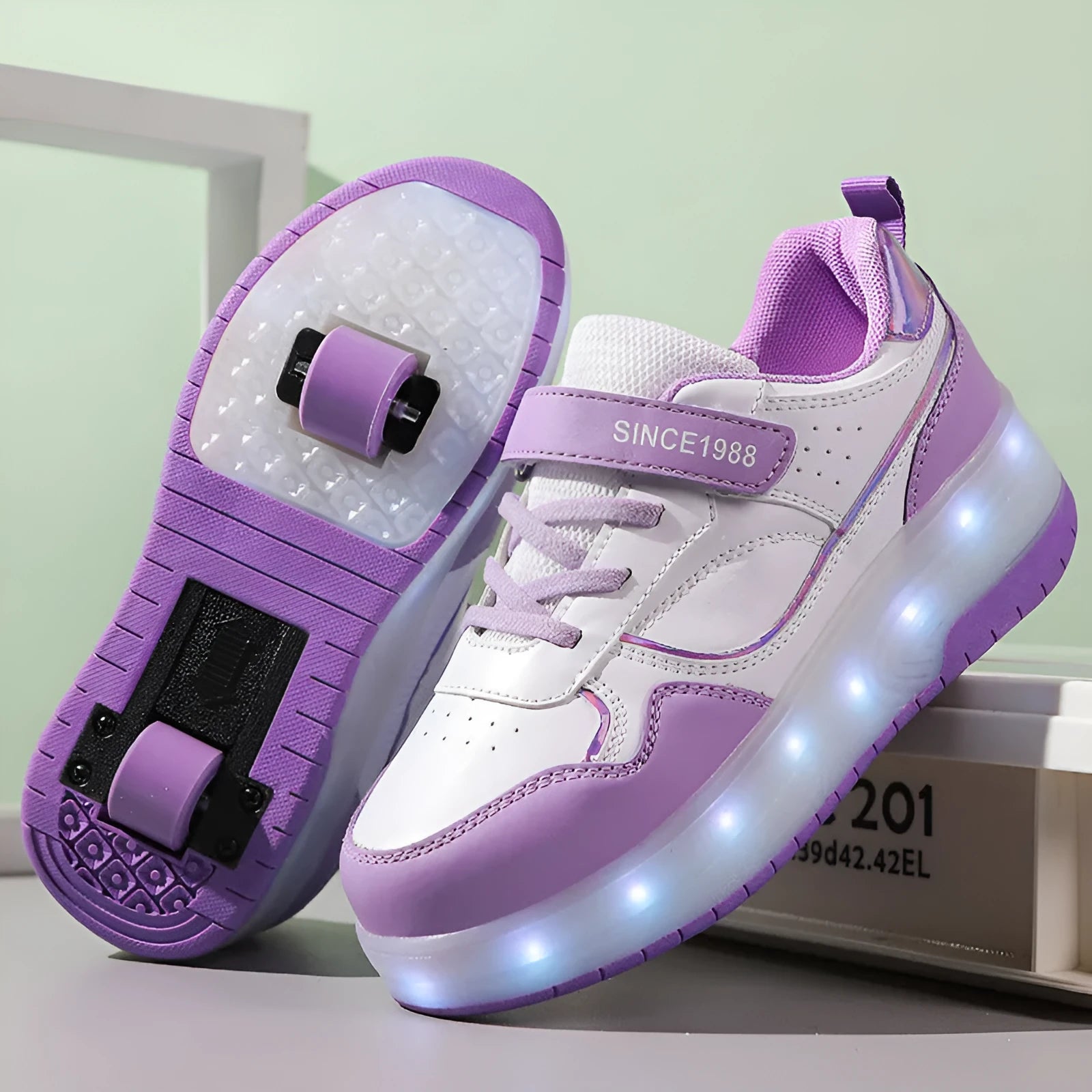 Kids' LED light-up roller skates with rechargeable wheels in pink, showing both two-wheel and four-wheel design options.