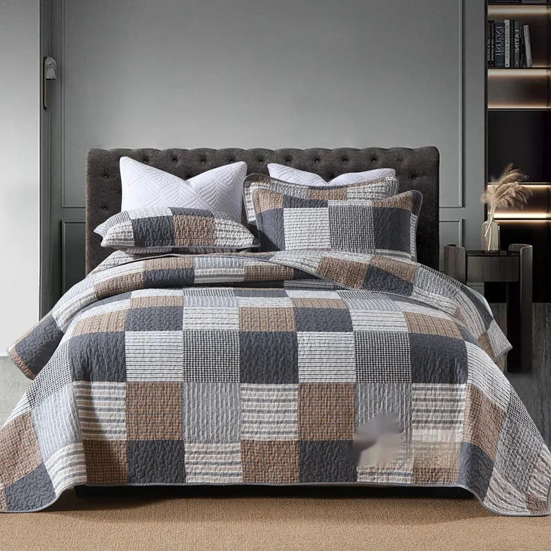 Quilted cotton bed cover set with printed pattern including bedspread and two pillowcases