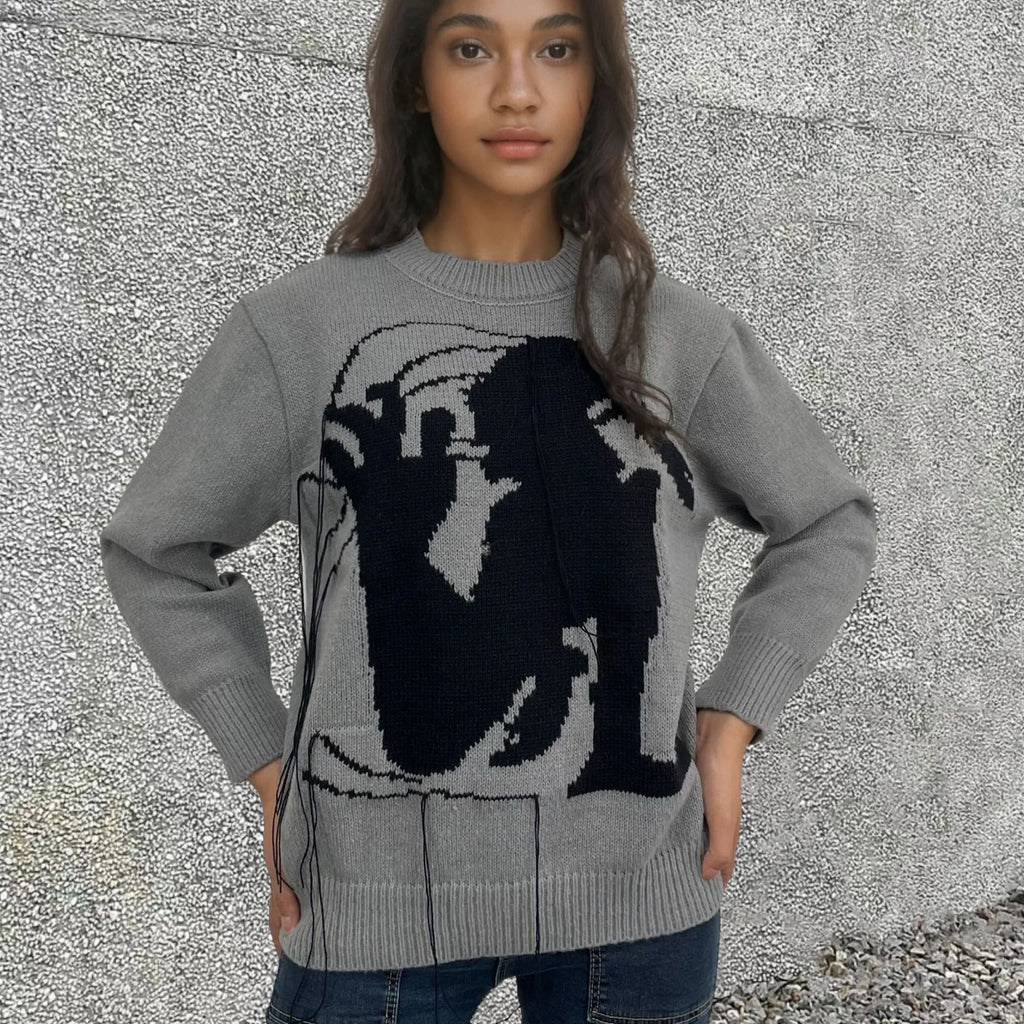 Women's loose alpaca wool sweater with abstract pattern and tassel detailing in street fashion style