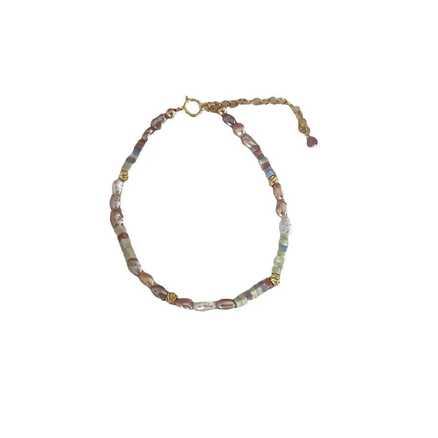 Natural pearl bracelet and necklace set with purple 14K gold accents and silver elements