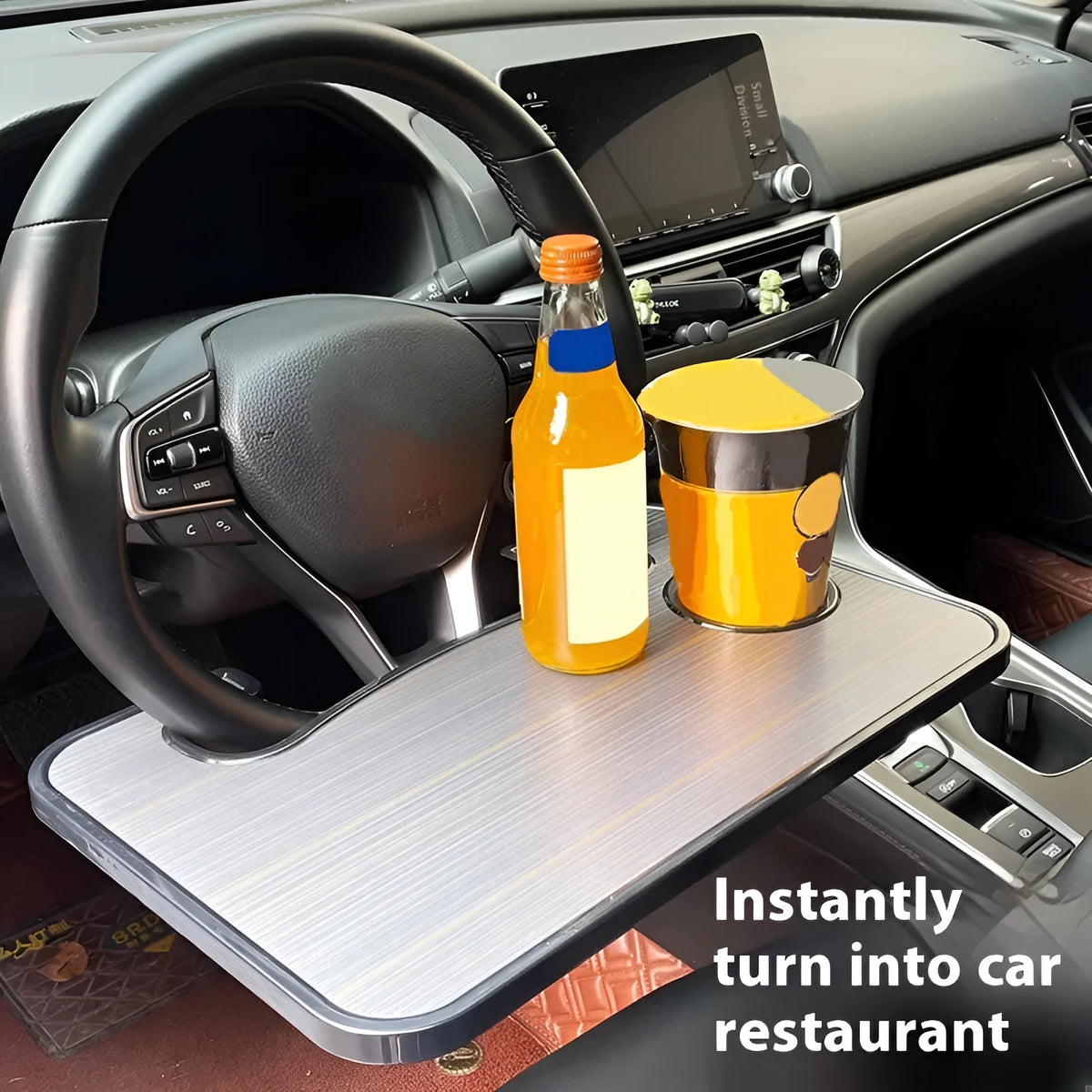 Black portable car steering wheel laptop stand and dining tray with foldable cup holder on a 42x28 cm surface