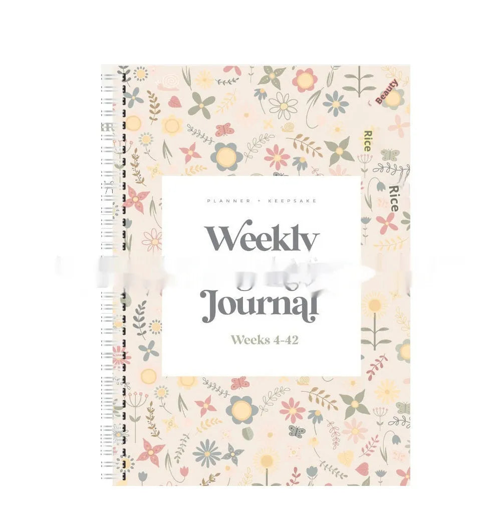 A5 weekly pregnancy diary notebook open to weekly tracking pages