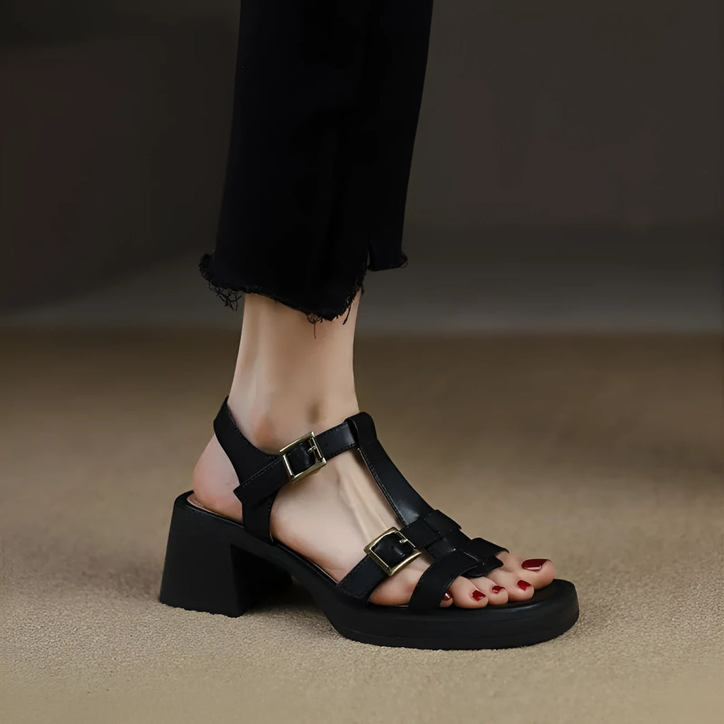 Women's black retro sandals with T-buckle fastening and chunky platform heel