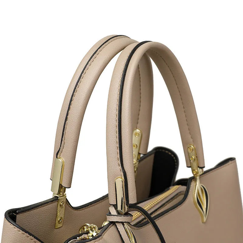 Women's black PU leather shoulder messenger bag with multi-layer compartments and sewing thread detailing