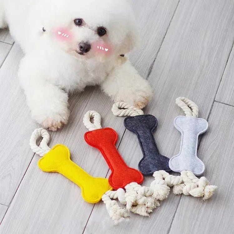 Bone-shaped dog toy with rope knots in four colour options showing dimensions of 16cm length