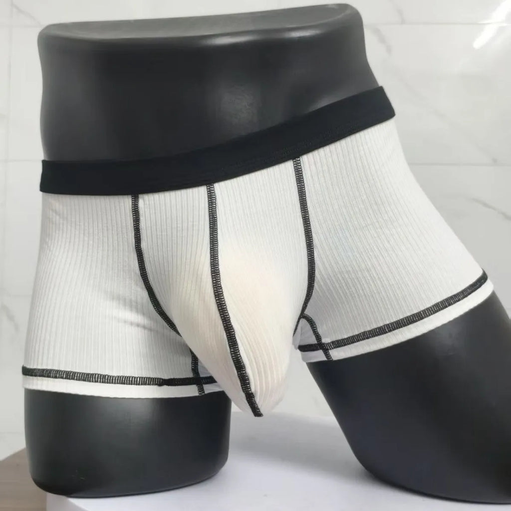 Men's solid colour breathable boxer shorts in white, black, grey, army green, and brown on a size chart.
