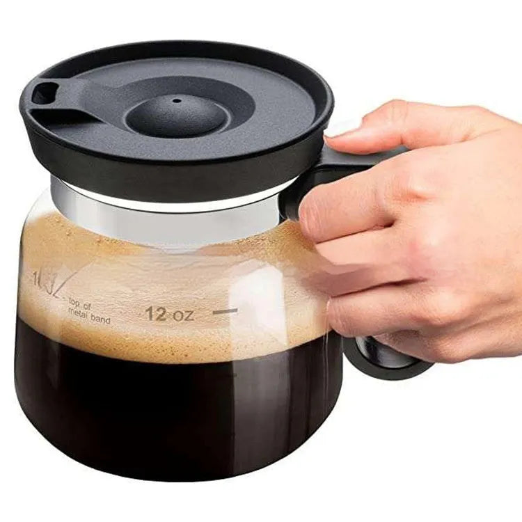 Transparent borosilicate glass coffee maker with silicone lid showing 355ml-473ml capacity markings
