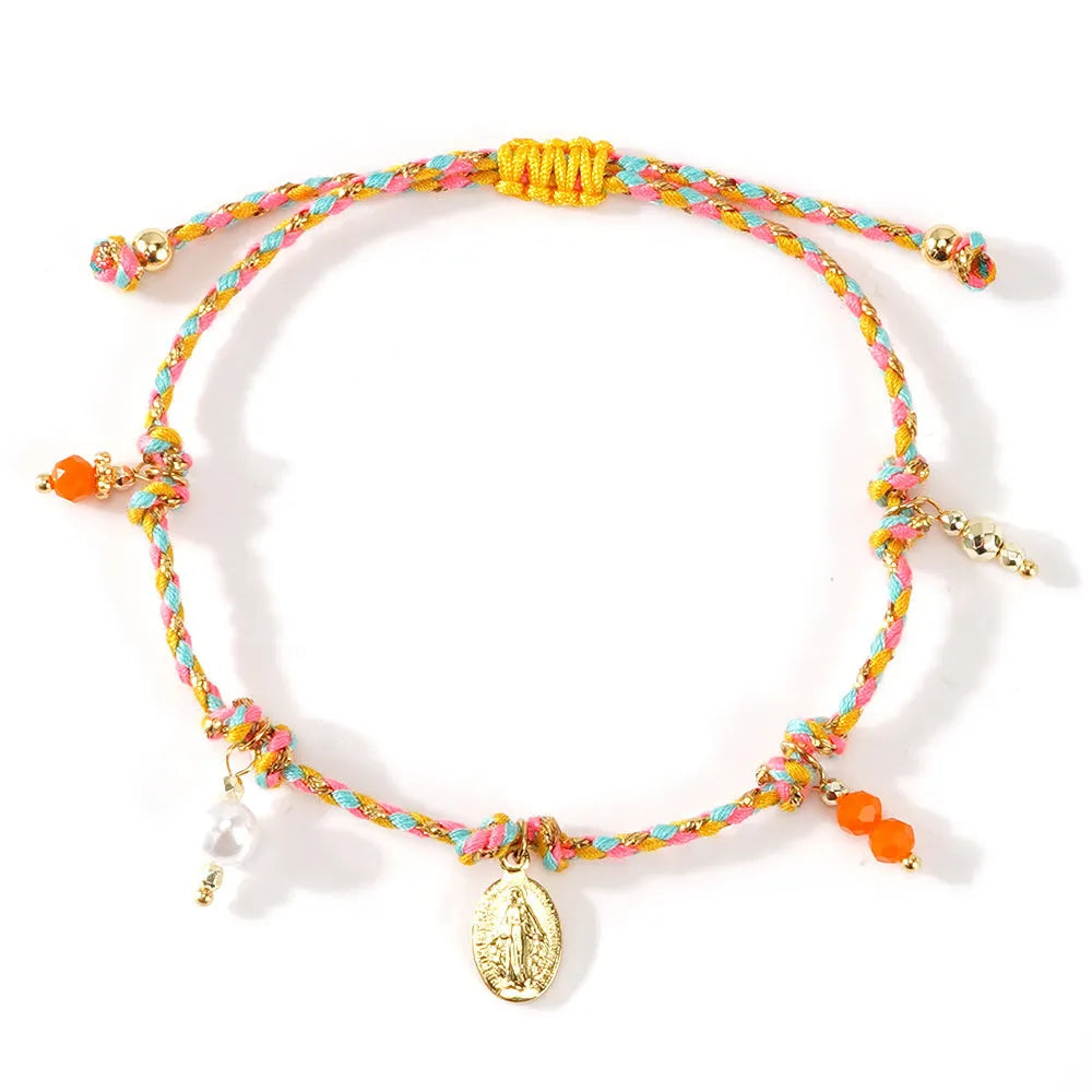 Close-up of a hand-woven colourful braided rope bracelet for women featuring an adjustable carrying strap tag closure.