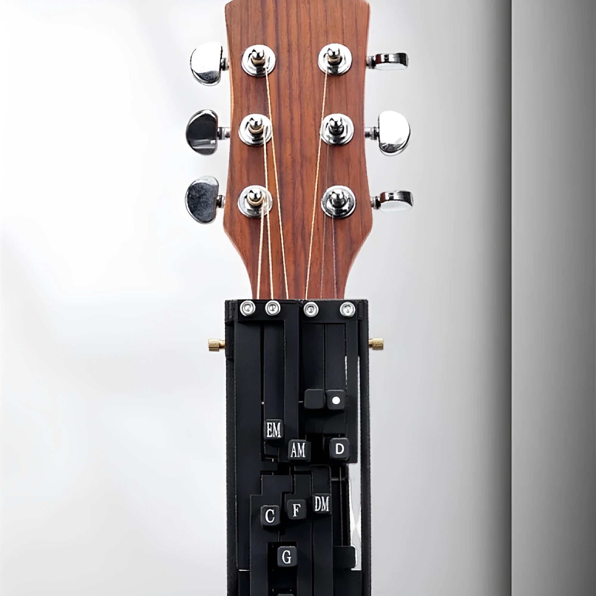 Black automatic chord changer device for novice guitar second chord practice