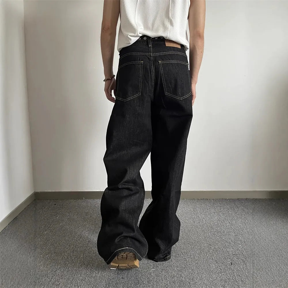 Black retro straight-leg jeans with loose wide-leg cut and zip placket