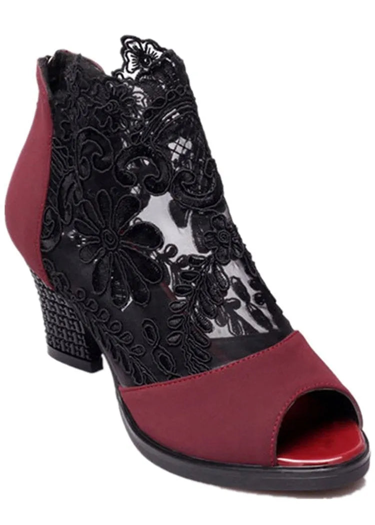 Black lace women's Gladiator sandals with a square high heel and peep toe on a zip closure