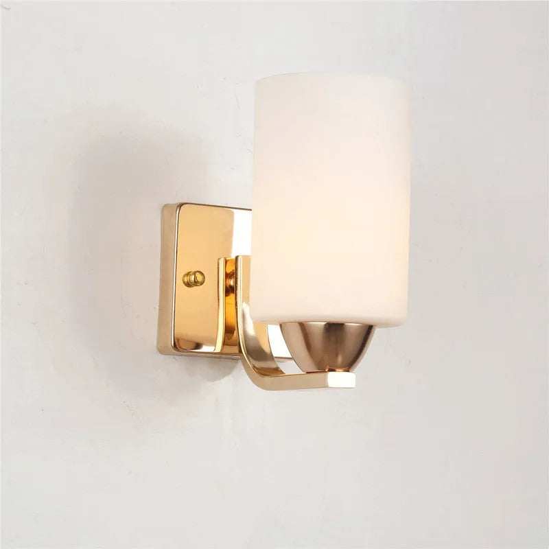 Chrome-finished minimalist glass wall lamp with adjustable dual heads for bedside lighting