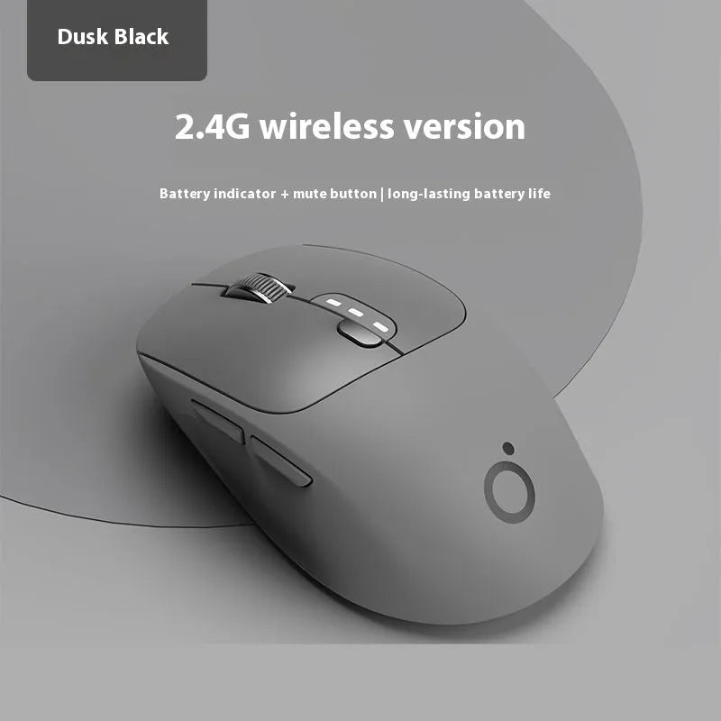 Mute wireless Bluetooth mouse in matcha green colour on a desk, showing ergonomic right-handed shape.