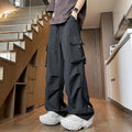 Waterproof plus size straight-leg trousers in black, white, or grey with drawstring waist
