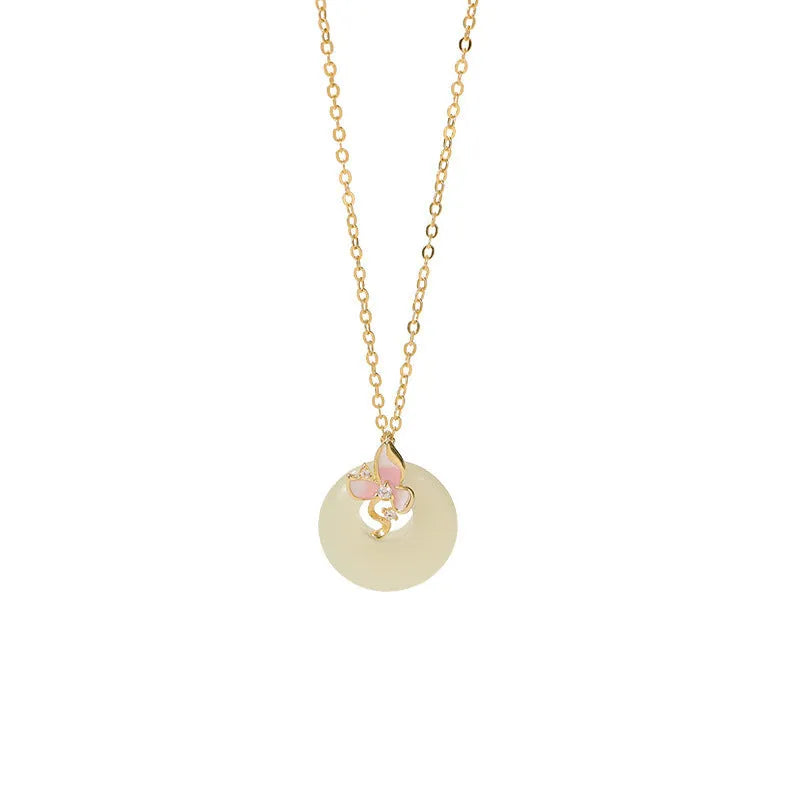 Silver orchid pendant necklace with geometric details and a safety buckle on an O-ring chain.