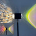 Sunset red floor lamp projecting a water wave light pattern onto a floor.