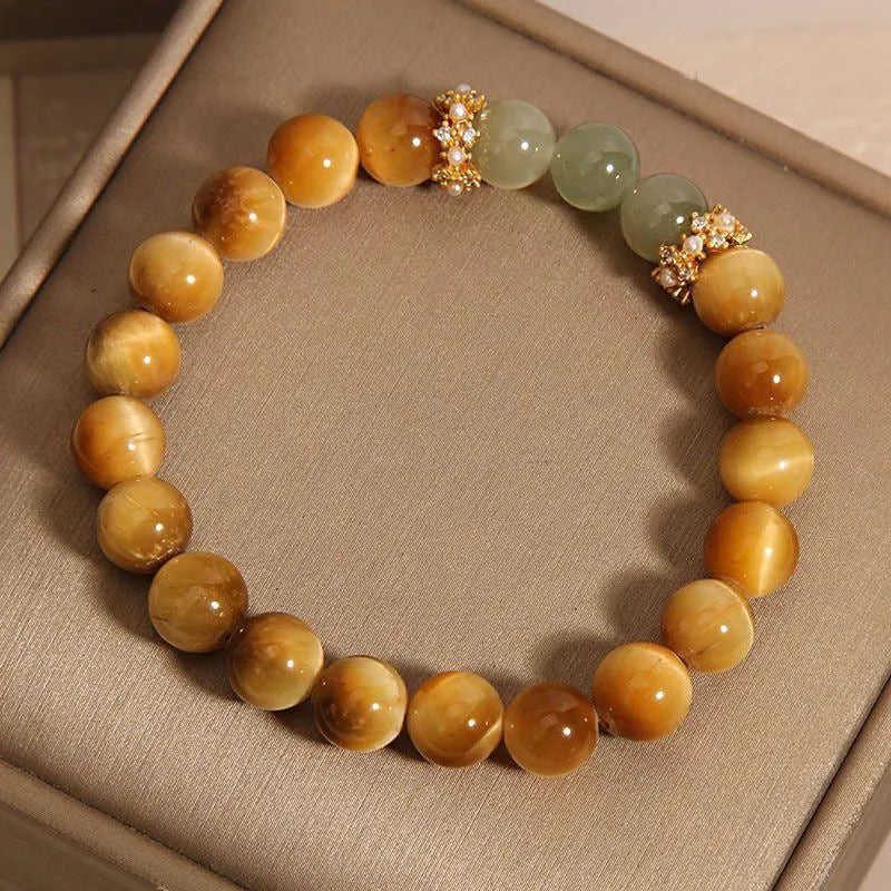 Natural yellow Tiger's Eye stone bracelet with Hetian jade accents in simple design