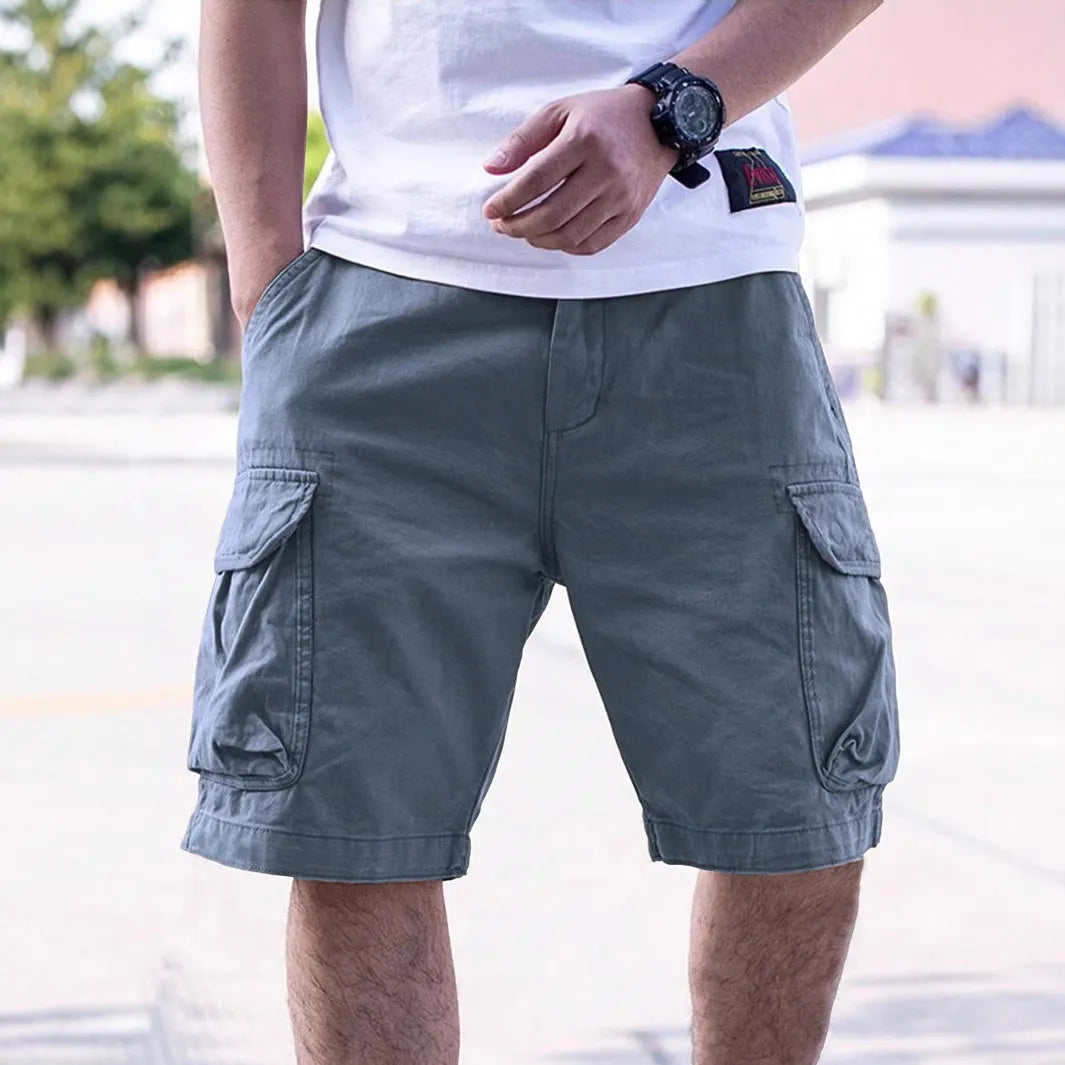 Men's loose fit cotton blend shorts in Army Green colour on a white background