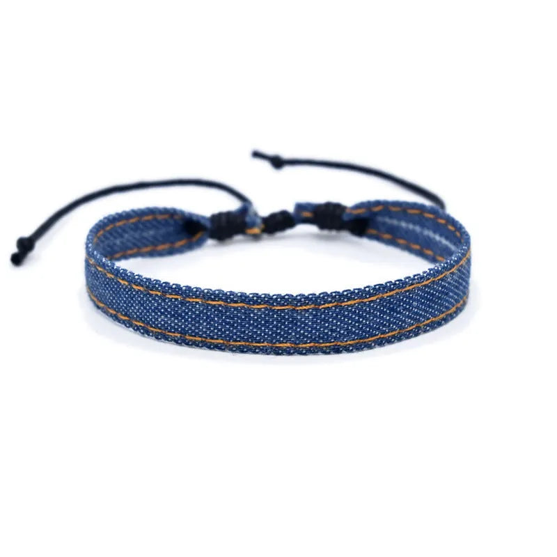 Denim fabric bracelet carrying strap with mixed materials and unisex design