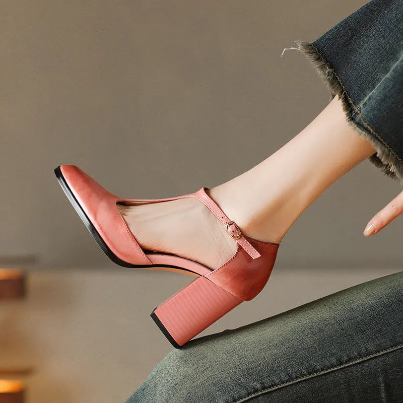 Baotou hollow-cut retro Mary Jane shoes in dark brown with pointed toe and buckle fastening.