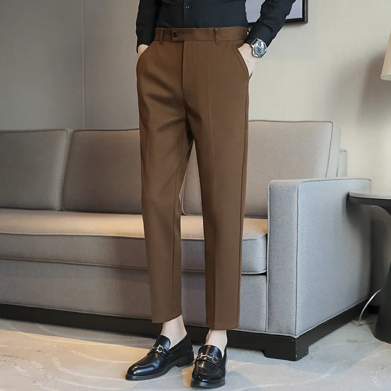 Straight fit brown corduroy trousers with elastic waistband on hanger