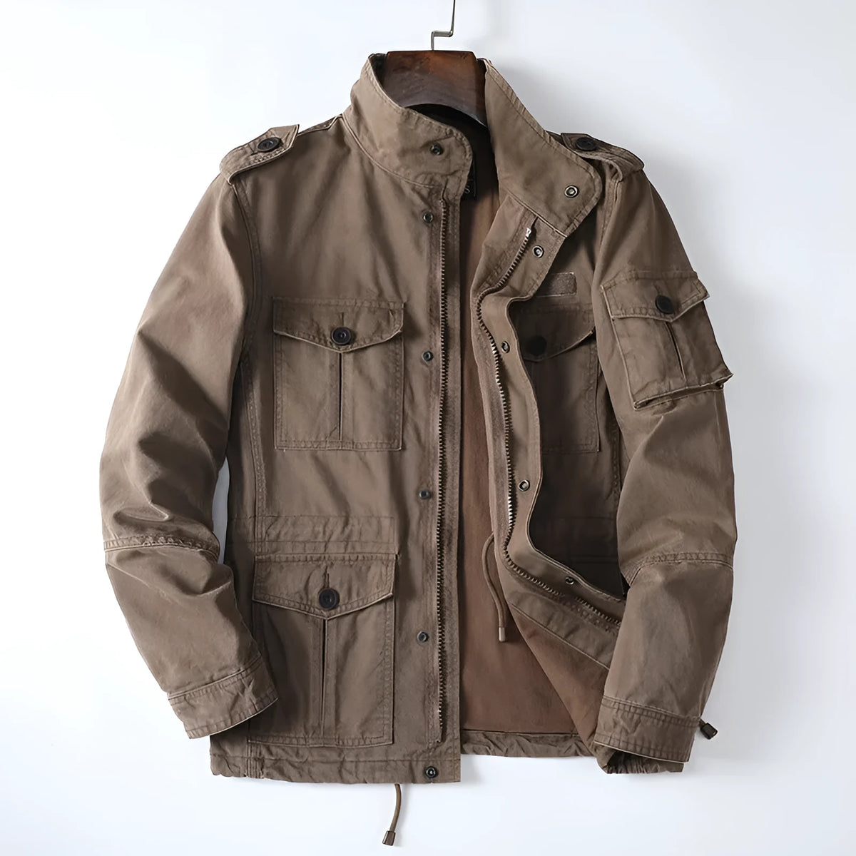 Man wearing a loose-fit light brown cotton twill retro jacket with a zip front.
