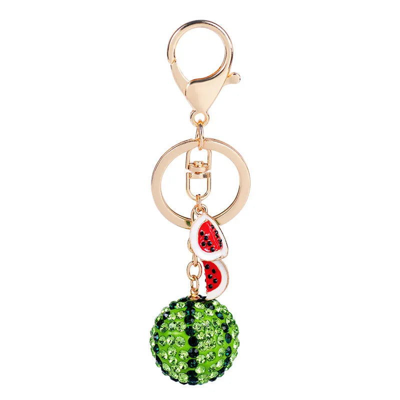 Green watermelon shaped zinc alloy keychain measuring 12cm with diamond detailing