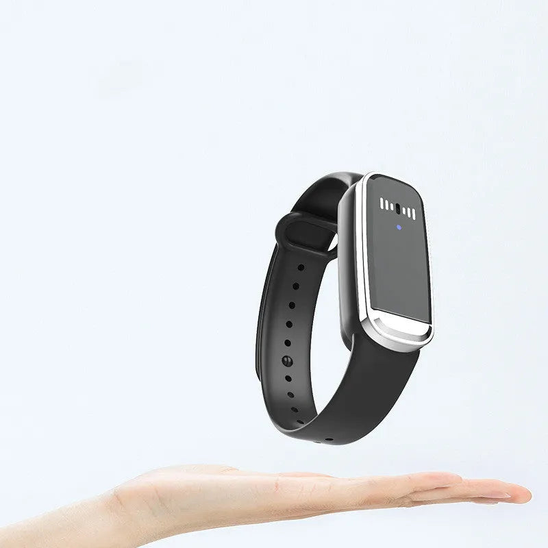 Ultrasonic mosquito repellent bracelet in black colour showing USB charging port and wristband design