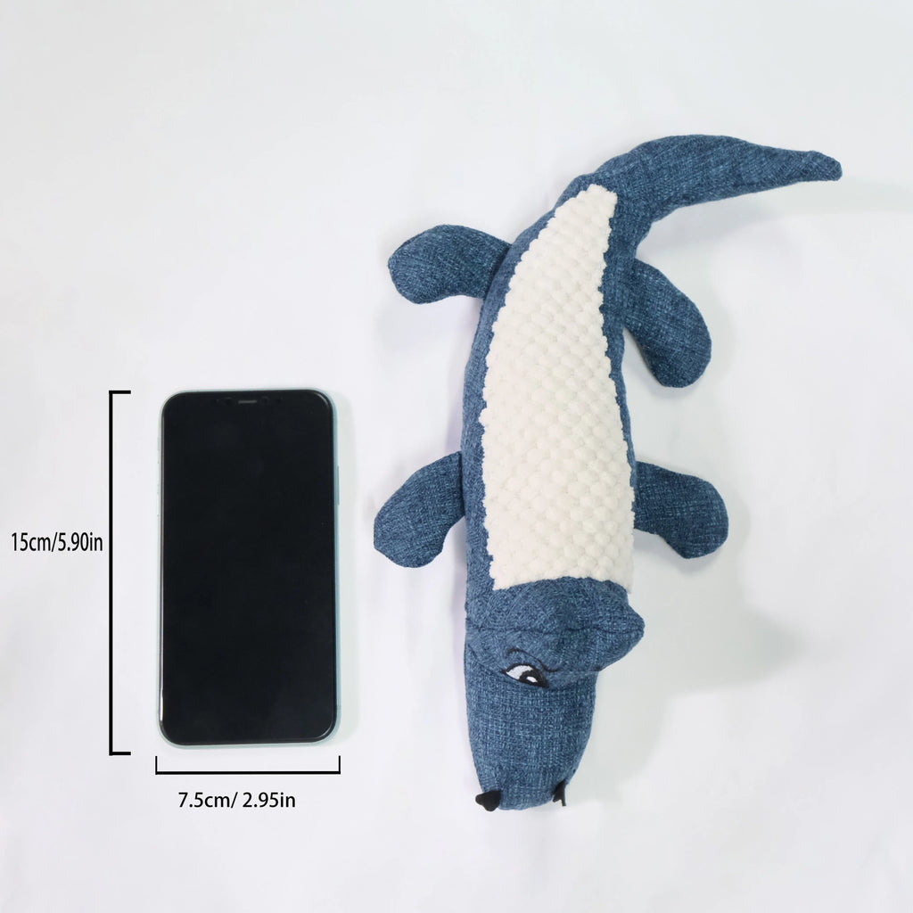 Blue, green, and red plush pet toys with a corn grid texture for chewing