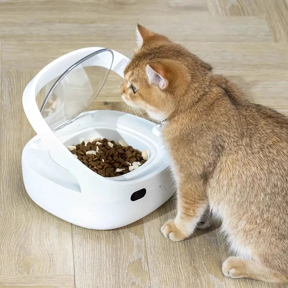 White NutriCare smart cat feeder with anti-stealing collar, food bowl, ice box, and charging cable set