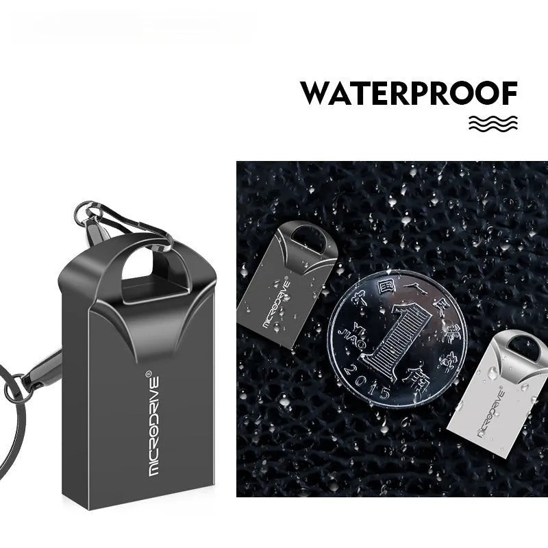 Small black and silver metal USB flash drive showing size comparison