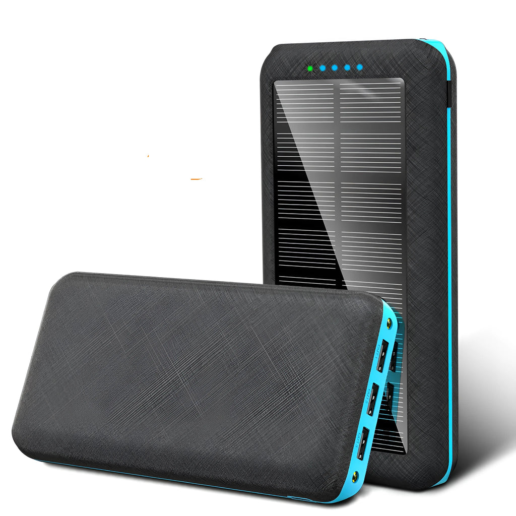 Black portable power bank with wireless Qi charging pad, three USB ports, and LED flashlight