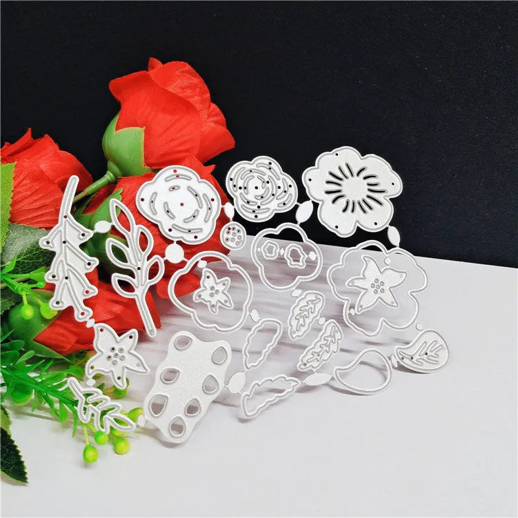 Silver carbon steel flower cutting die with plant design measuring 14.3 by 9.9 centimetres