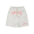 A pair of cropped, loose-fit sweatpants in a cotton blend fabric for casual streetwear.