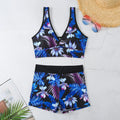 Women's two-piece swimsuit with printed boxer shorts in multicolour pattern