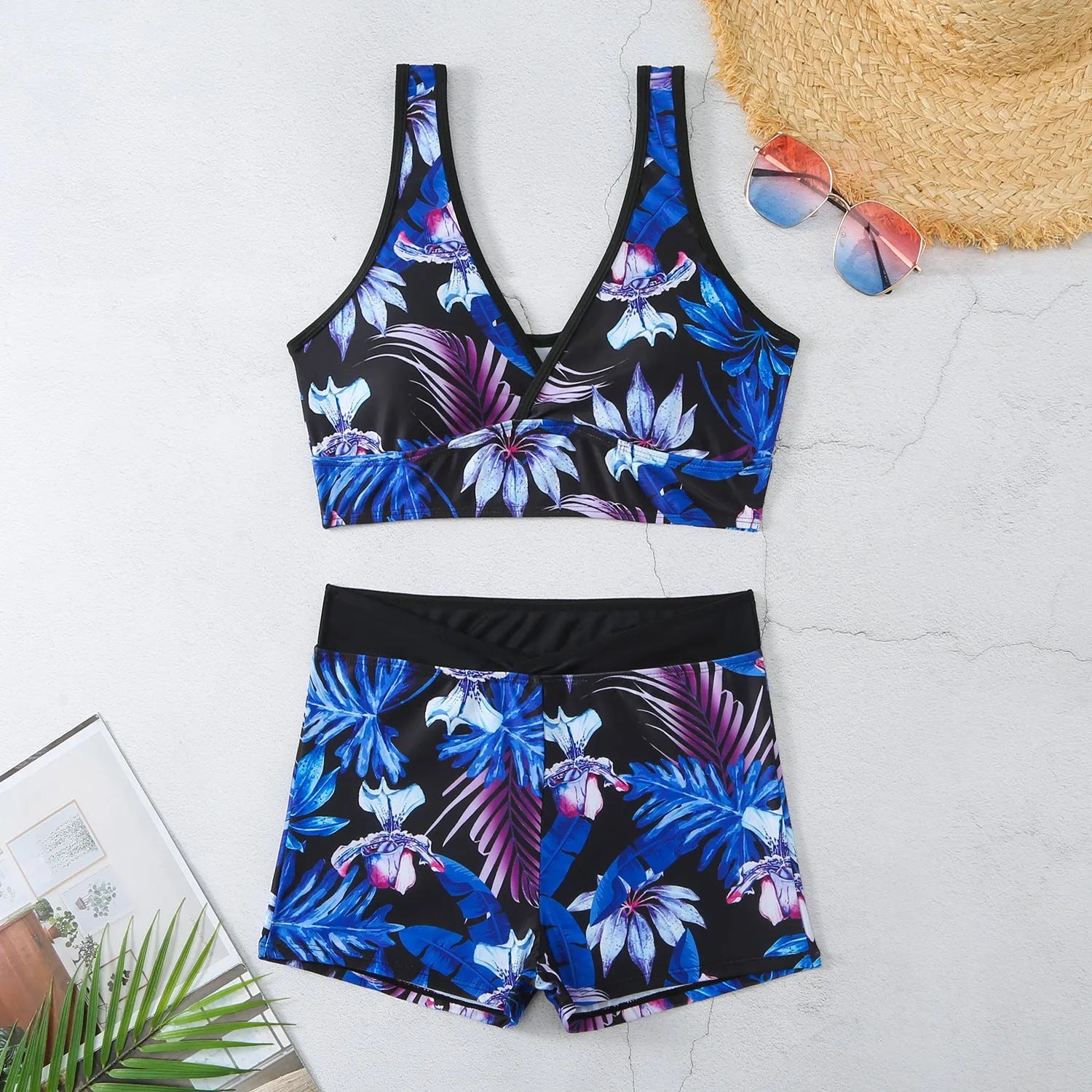 Women's two-piece swimsuit with printed boxer shorts in multicolour pattern