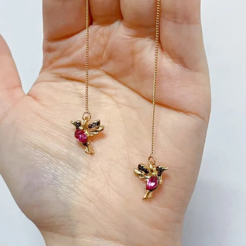 Long style bird hanging earrings with mixed zirconium wings in electroplated alloy construction