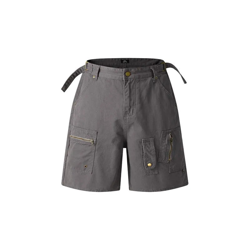 Retro loose-fit workwear shorts in washed cotton fabric with a zipper fly, shown in camouflage colour.