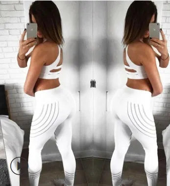 Women's black workout leggings with glow-in-the-dark print pattern for fitness activities