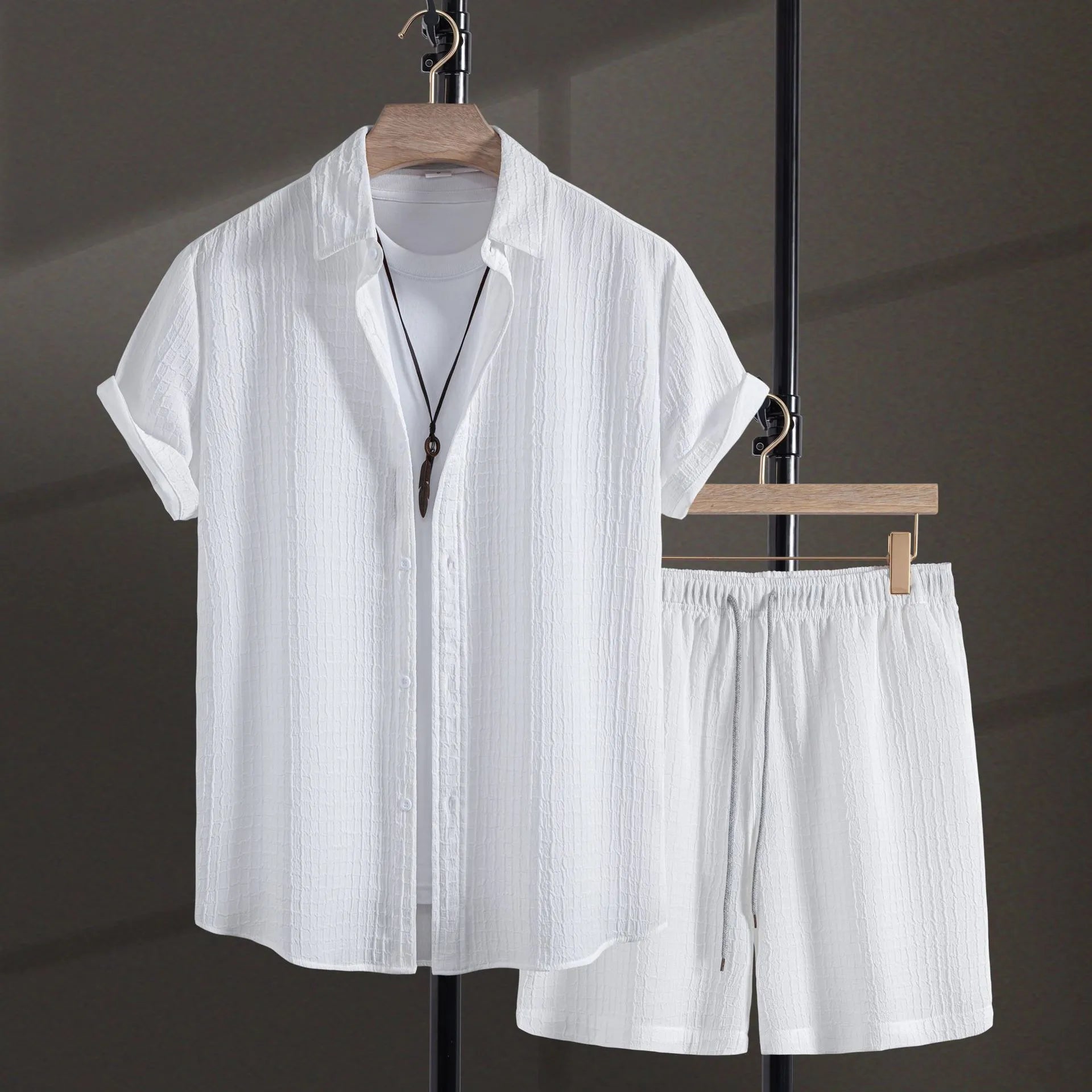 Man wearing a white cotton blend jacquard short sleeve shirt and matching shorts casual suit