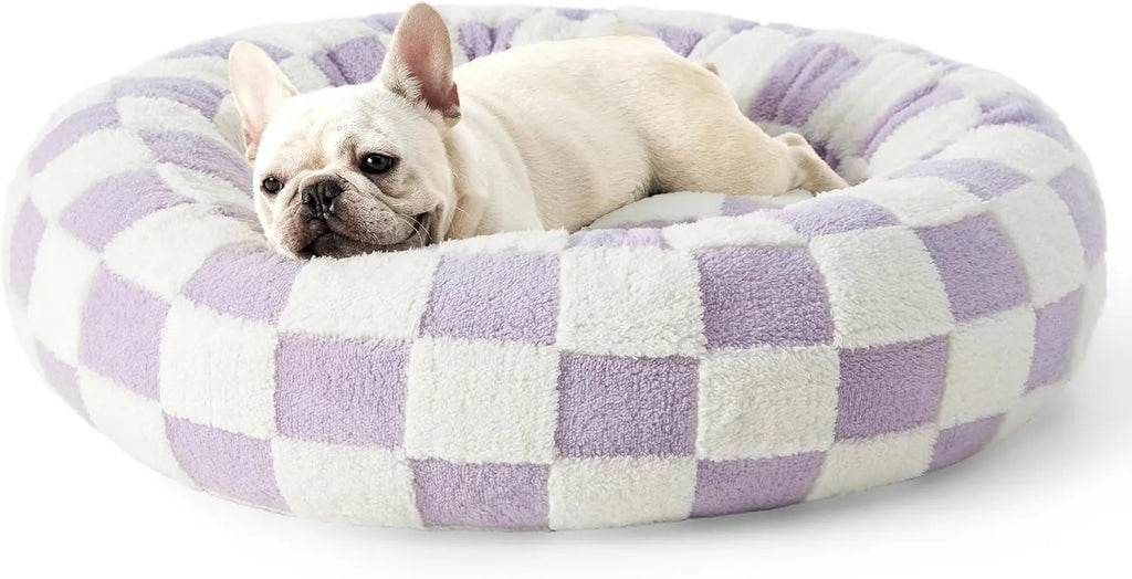 Round plaid dog bed with plastic base, shown in sea blue and white colour, with removable washable cover.